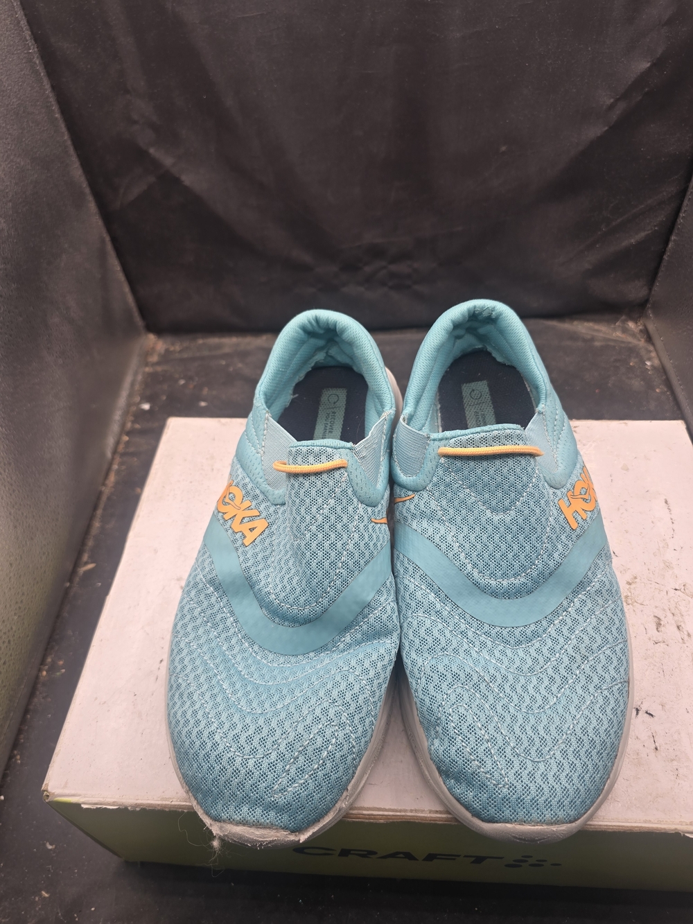 Hoka Women's Slip-On Athletic Shoes in Teal with Orange Accents